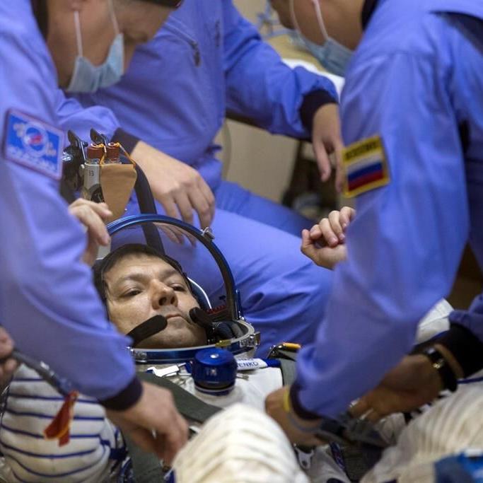 A Russian cosmonaut sets a new record for the most time in space